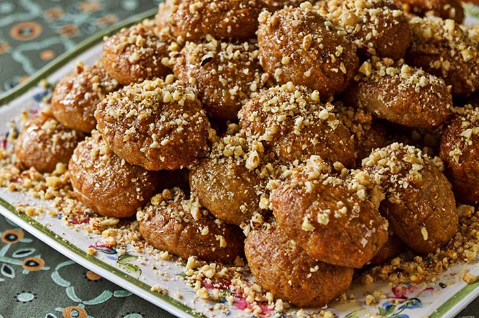 MELOMAKARONA: Greek Traditional Christmas cookies with crushed walnuts. MELOMAKARONA: Greek Traditional Christmas cookies with crushed walnuts.
